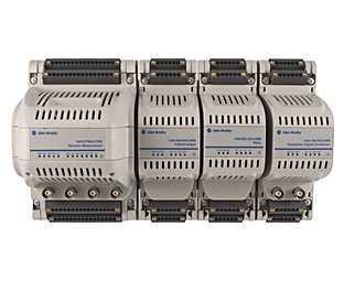 A set of 4 gray condition monitoring control modules with a wider main module on the left followed by three expansion modules. All include removable terminal connections on the base, vertical venting holes and product labels on the module face with dark blue text and Allen-Bradley logo